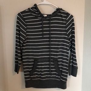 Gray and white striped pullover. Size medium.